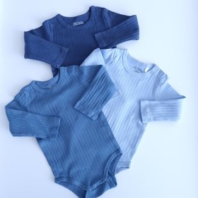 Photo Lot bodys bout’chou 9 mois